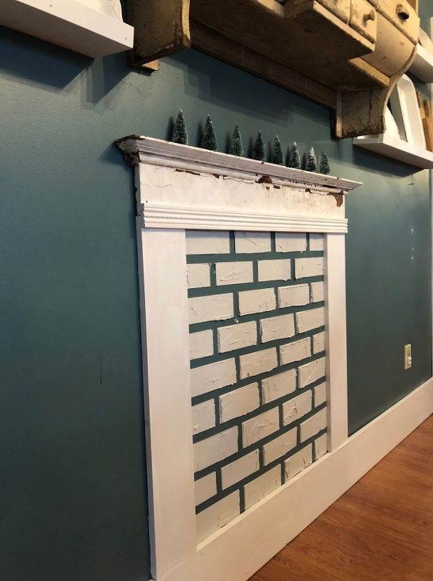 diy faux fireplace with faux brick chimney