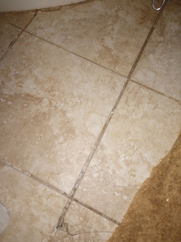 q how do i fix a bathroom tile floor without tearing everything out