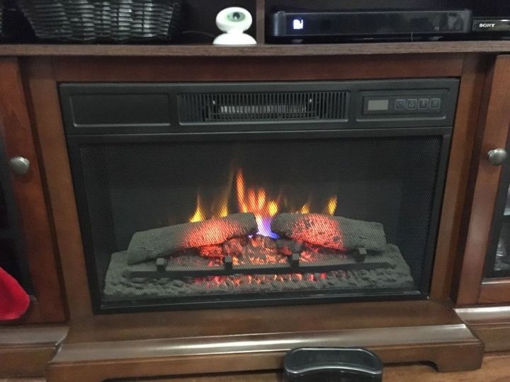 how do i clean out the dust inside this electric fireplace