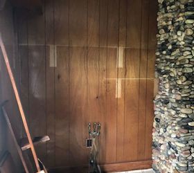 painting wood paneling opening up a wall in a small living room