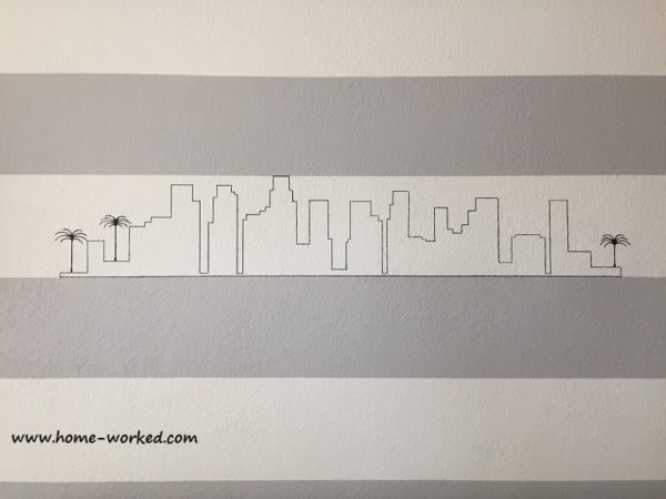 dibujo a mano del horizonte de la ciudad en una pared con textura