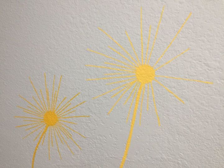 painted dandelions on knockdown wall texture