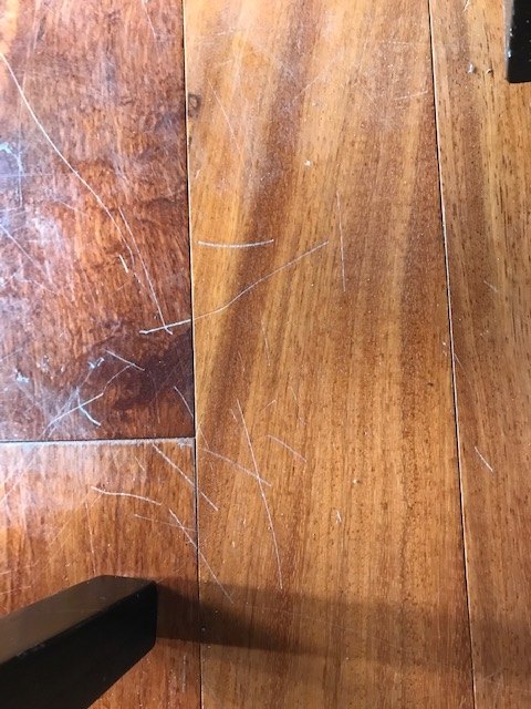 q how can i avoid my chairs scratching my hardwood floor