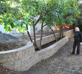 13 easy diy backyard landscaping ideas, Backyard Retaining Wall John Riha