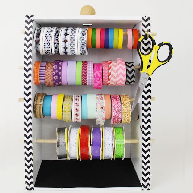 8 ways to turn cardboard boxes into beautiful storage for your home, Make a washi tape organizer dispenser