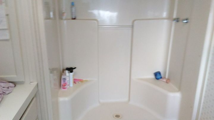 An Oval Bathtub In A Square Shower, What Is The Size Of A Mobile Home Bathtub