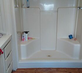 q put a oval bathtub in a square shower in a manufactured home