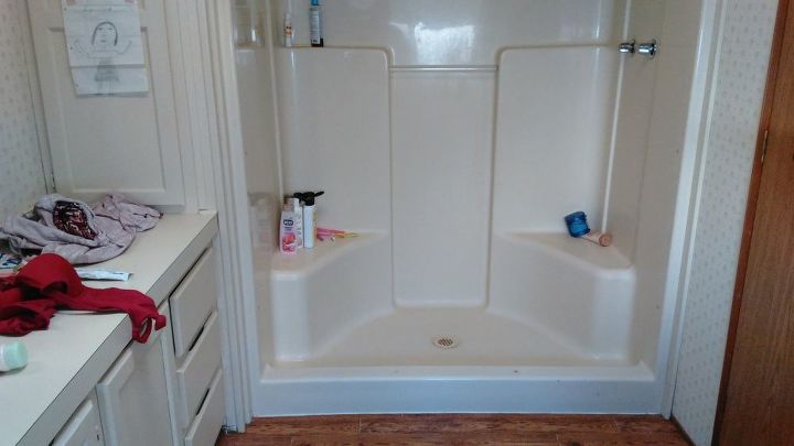 An Oval Bathtub In A Square Shower, Mobile Home Bathtub Size