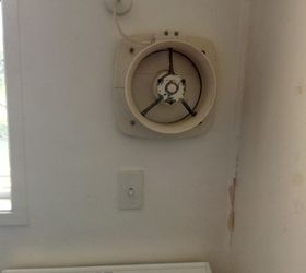 how can i hide an ugly extractor fan