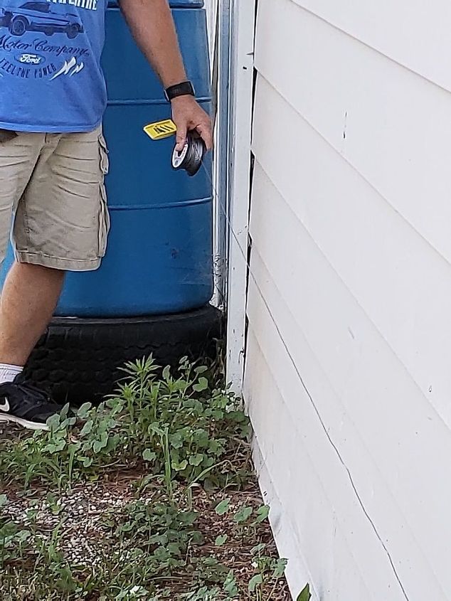 how to use logs as edging for plants make a wall trellis, Running the wire from one side to the other