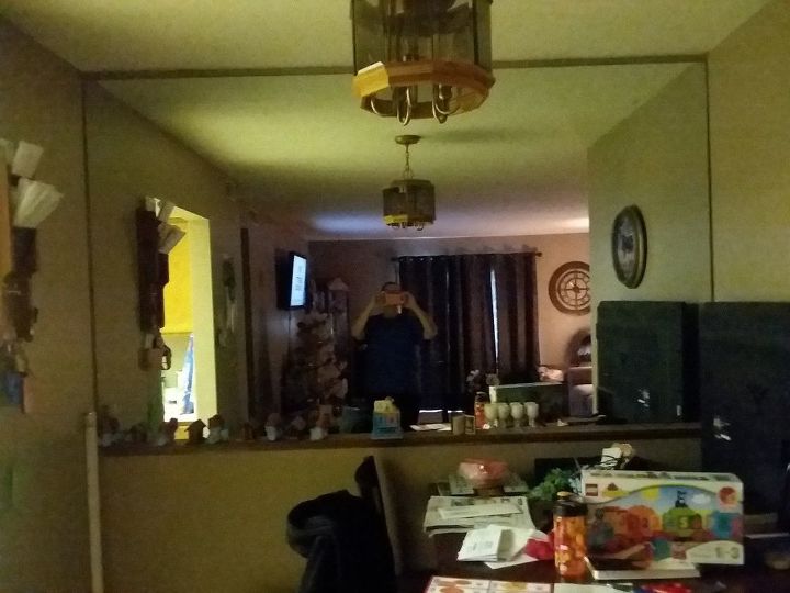 q what can i do with this large mirror with out taki g it down