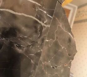 q how can i glu a broken piece of marble back to a table