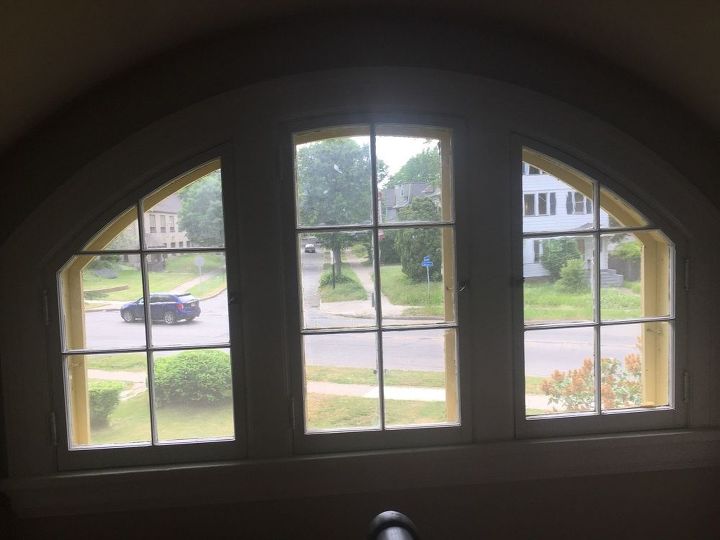 q how to decorate a curved multi pane window
