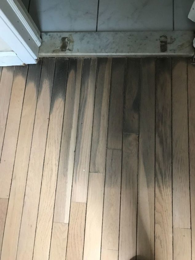 q how do i removed the water stain on wood floorings