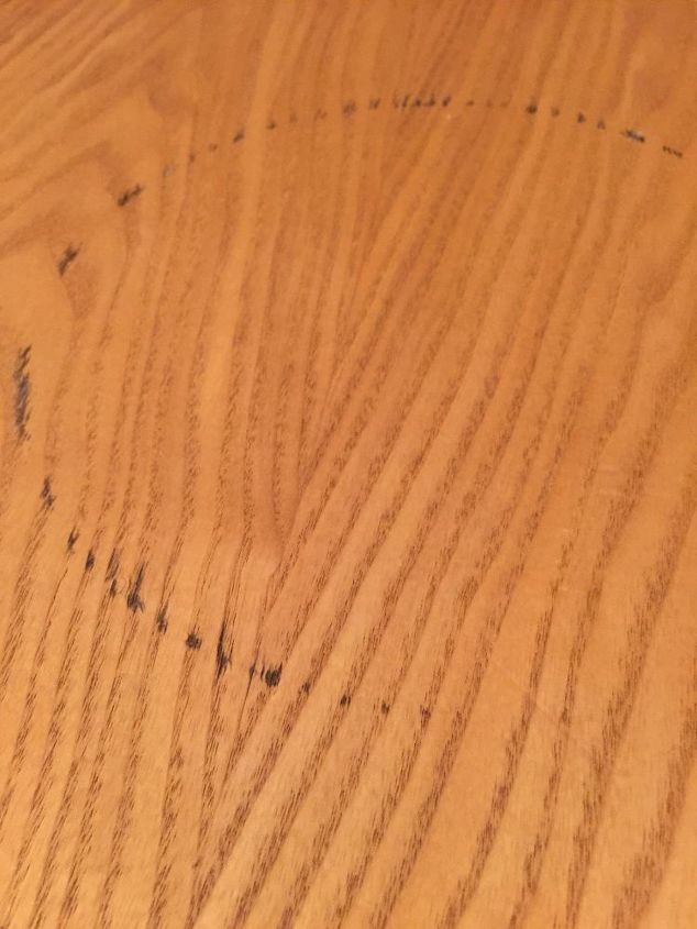q can i get rid of this rust ring off my wooden table