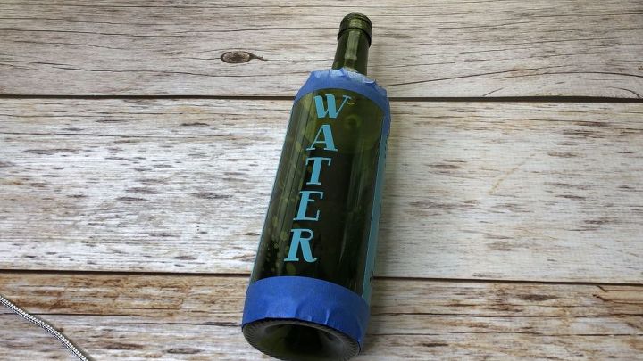 botella de vino reciclada grabada
