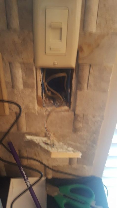 how to cover up old phone outlet where there is tile already in place