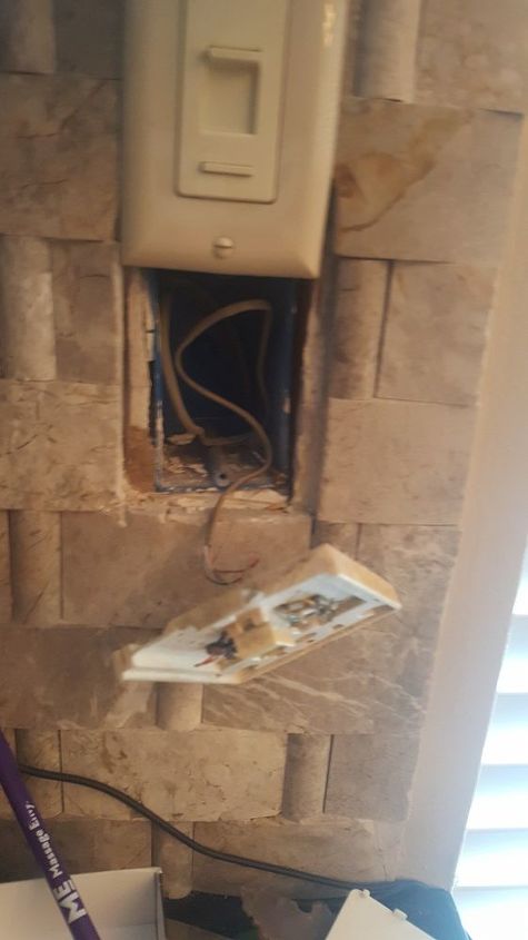 how to cover up old phone outlet where there is tile already in place