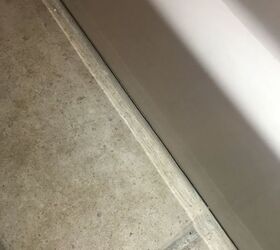 q how to economically fix grout cracks in bathroom