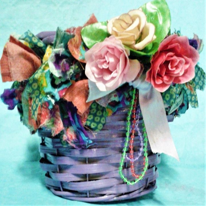a wicker basket customized in shabby chic or bohemian storage