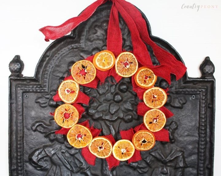 17 gorgeous diy christmas wreath ideas you ll love, Dried Clementine Christmas Wreath Elizabeth at Country Peony
