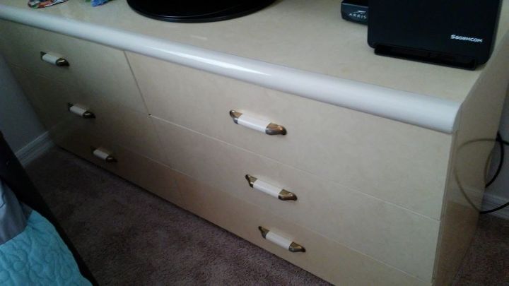 q how to i fix this yellow italian formica dresser