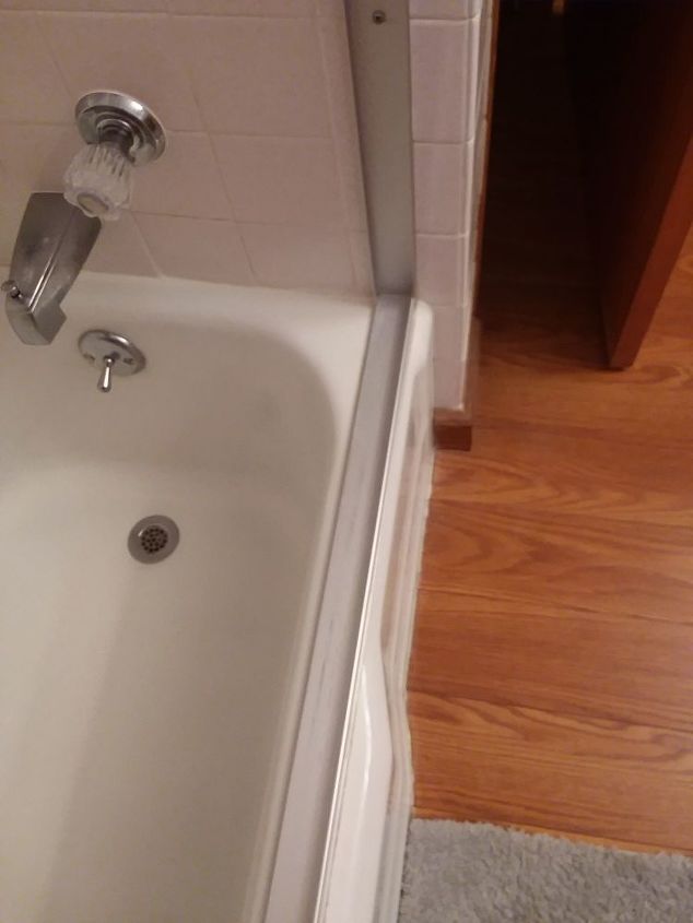 q how can i cover a sliding glass tub track
