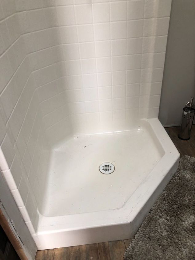 q how do i hang a shower curtain