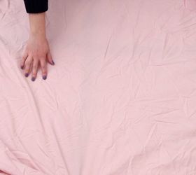 Spread an old fitted sheet on your floor for designer floor decor