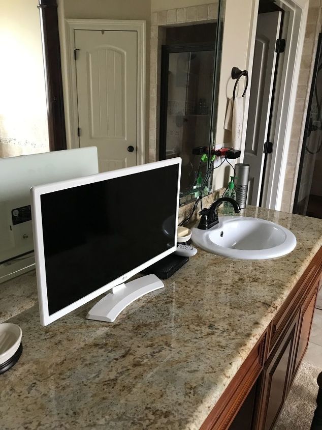 how to put a small 24in television in your bathroom without mounting