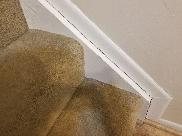 how do i prevent cracks between my stair skirt and wall molding