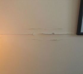 how do i repair a drywall tape crack on my living room wall