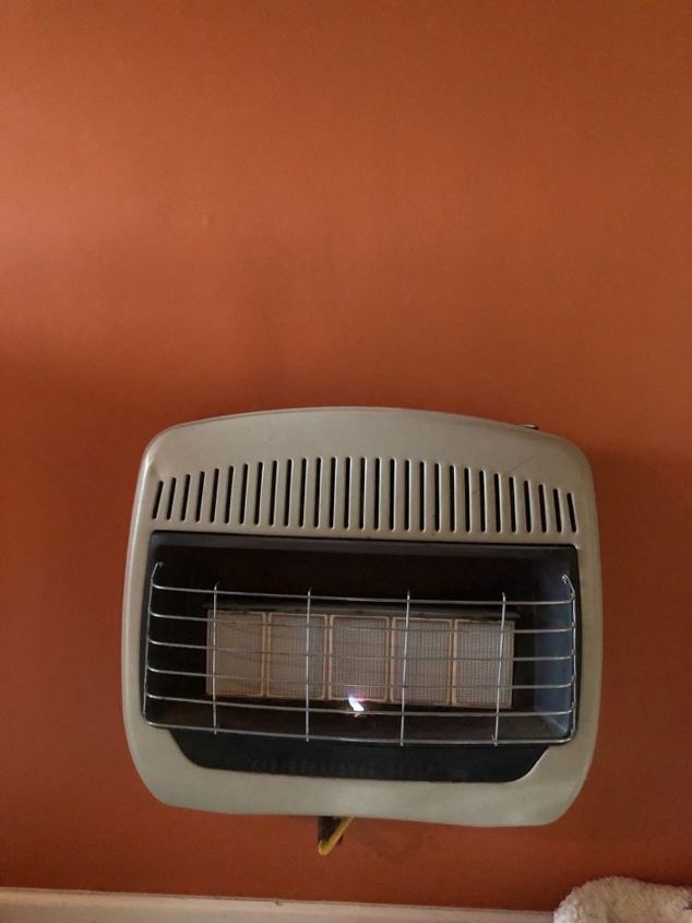 how do i make my gas wall heater look more like a fireplace