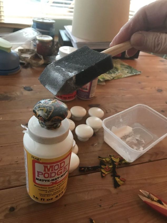 boho decoupage fabric drawer knobs, Cover the surface fabric with Mod Podge