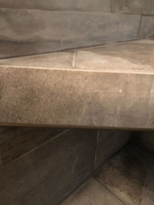 how do i fix sharp edge of tile on shower bench