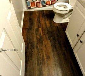 easy budget friendly diy bathroom makeovers, Peel and Stick Hardwood Floors for Your Bath A Grace Full Life