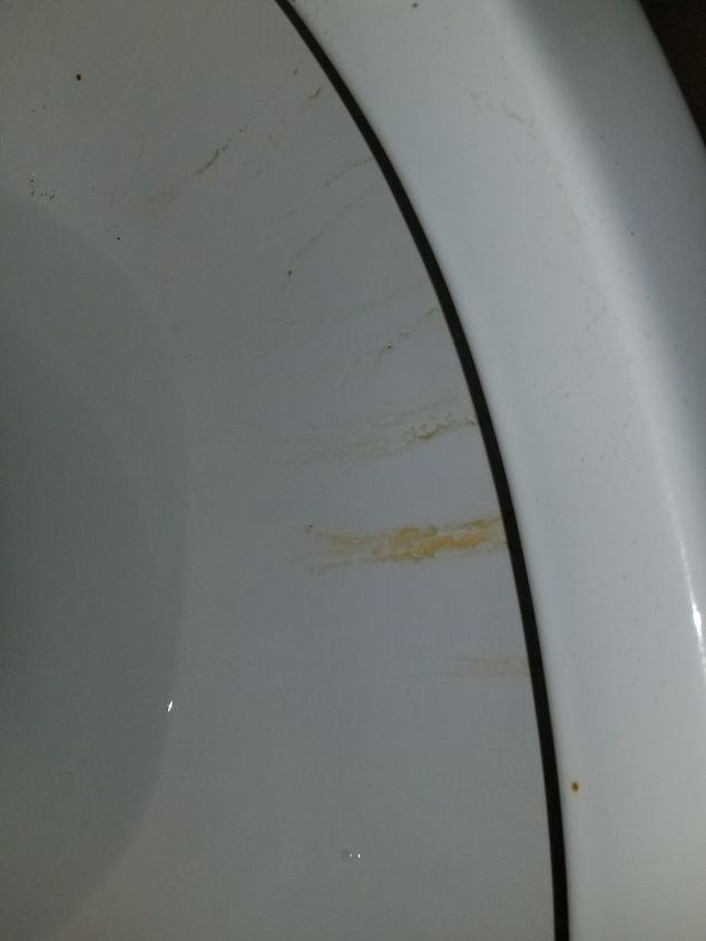 q how do i remove brown toilet stains
