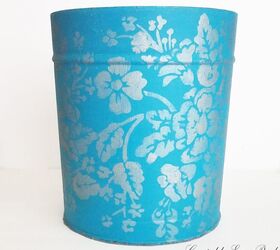 upcycled popcorn tin into a beautiful trash can