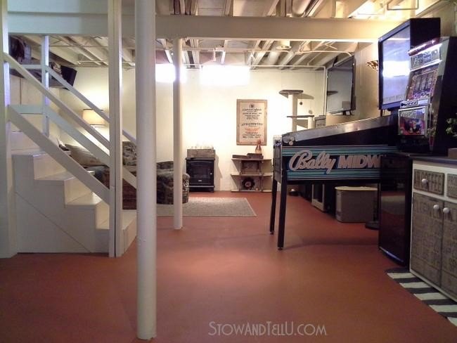 11 amazing basement remodeling ideas, Basement Remodel Lighting Amy Ellis StowandTellU