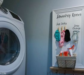 adorable laundry room storage from an old cabinet door