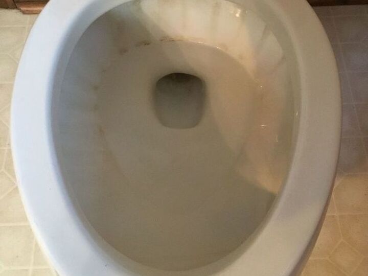 q how to gets stains out of toilets
