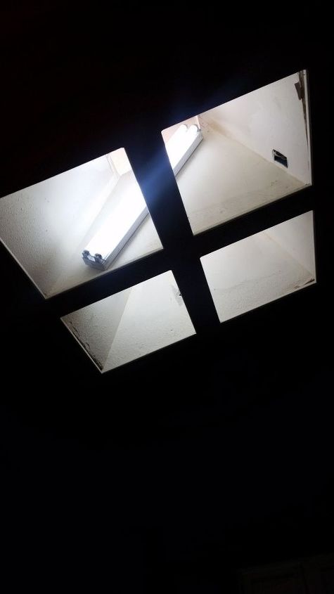 q any ideas on what to do with this kitchen skylight