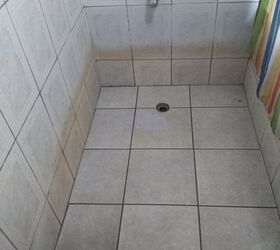 q how do i clean the 2 bottom rows of my bathroom wall tiles