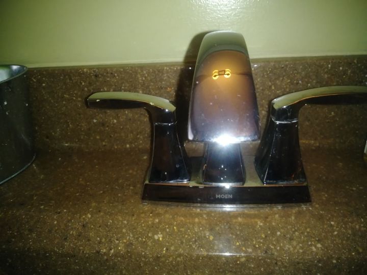 q how do you open faucet handle to change cartridge