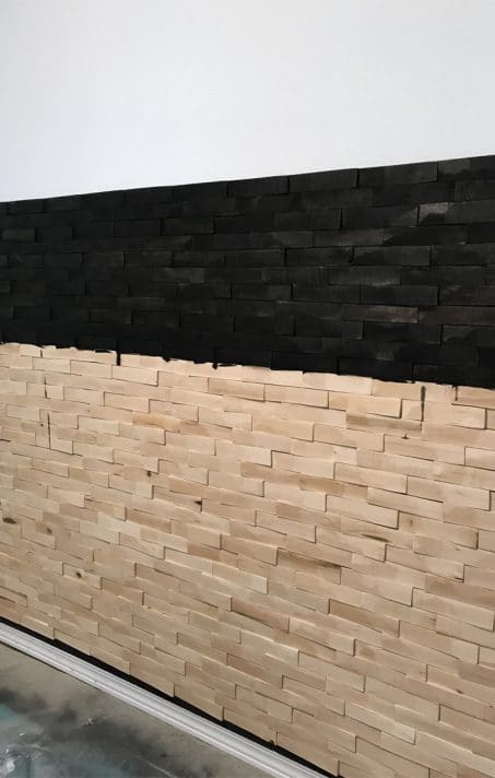 how to create a dramatic wall accent using wood shims