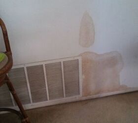 q how to paint over water spots on my wall from a water leak