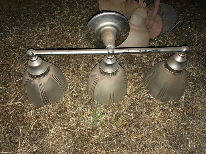 updating your old bathroom light fixture to industrial light fixture