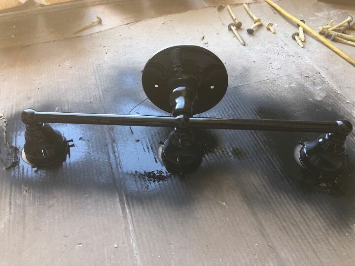 updating your old bathroom light fixture to industrial light fixture