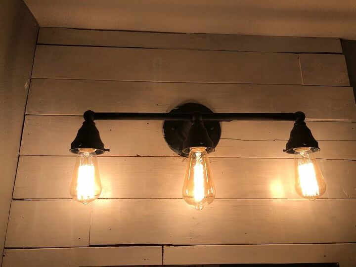 updating your old bathroom light fixture to industrial light fixture