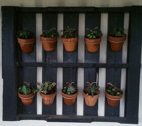 turn a pallet into a plant hanger